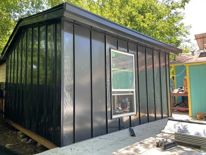 Black standing seam metal wall panels for Metal Roof Installation in Felida